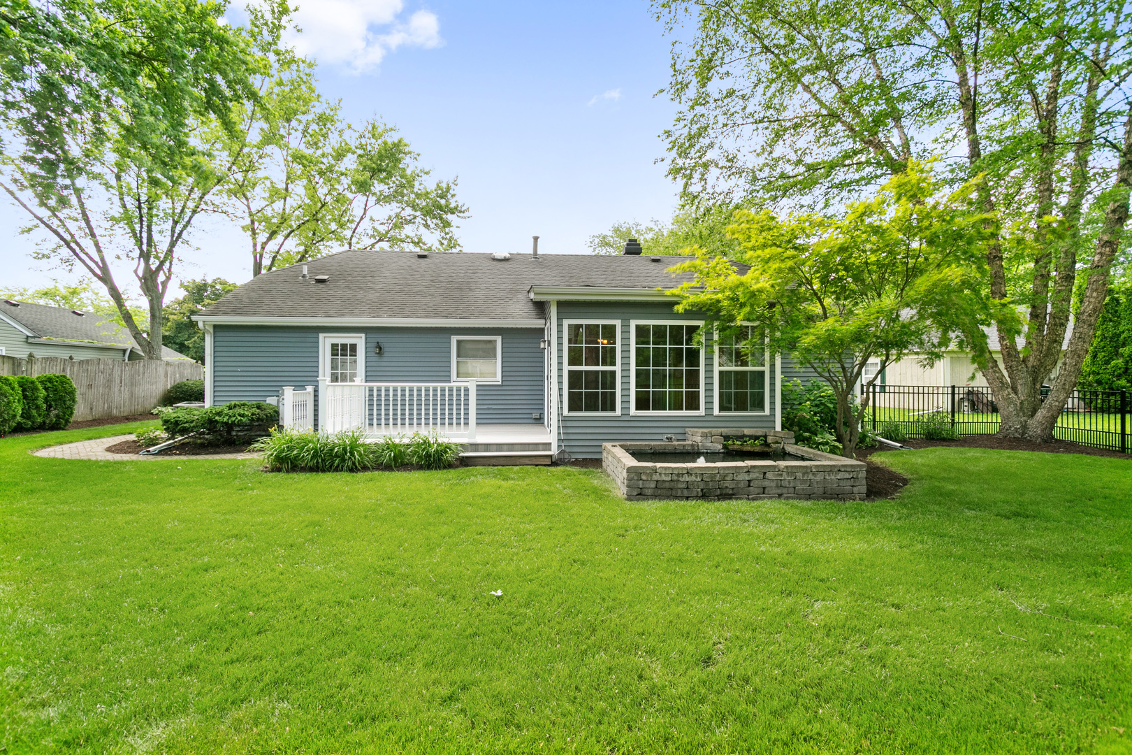 314 Boulder Hill Pass Montgomery, IL 60538 - Photo 2 of 19 a view of a house with a yard and a large tree