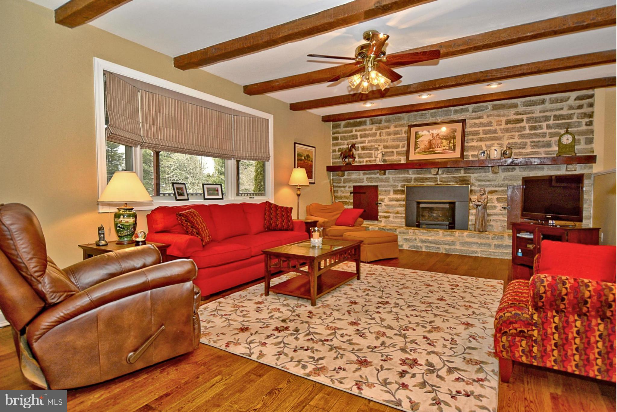 16441 Jm Pearce Road Monkton, MD 21111 - Photo 10 of 29 Main house living room with stone, gas fireplace