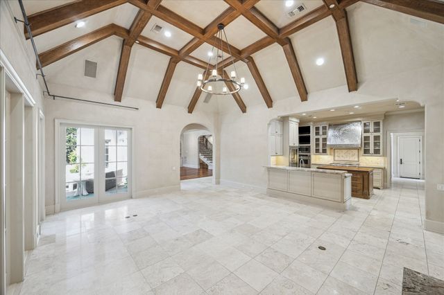 a view of an entryway with a kitchen