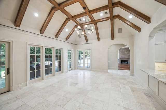 a view of an entryway with an empty room