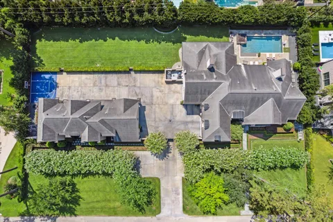 a living room with fireplace furniture and a open kitchen view
