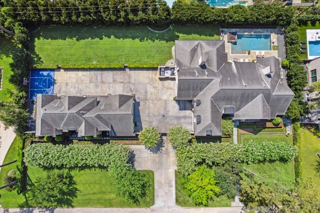 a living room with fireplace furniture and a open kitchen view