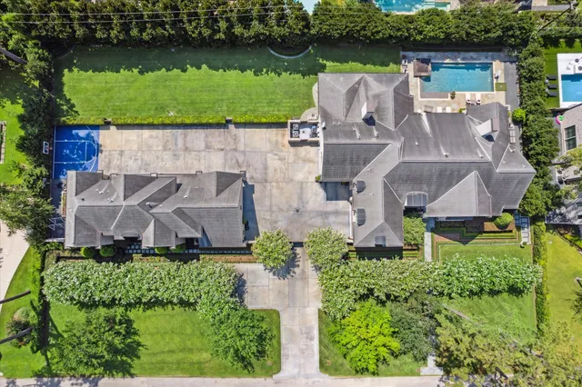a living room with fireplace furniture and a open kitchen view