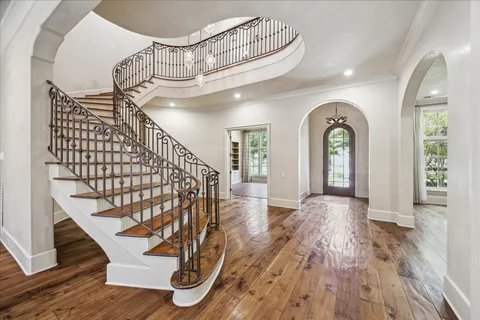 a view of entryway with wooden floor