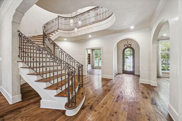 a view of entryway with wooden floor