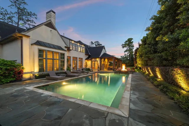 a view of a house with swimming pool