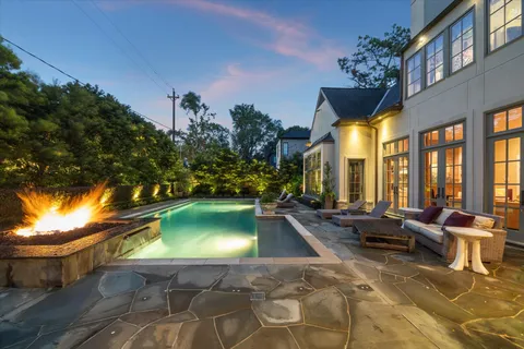 a view of a garden and basketball court