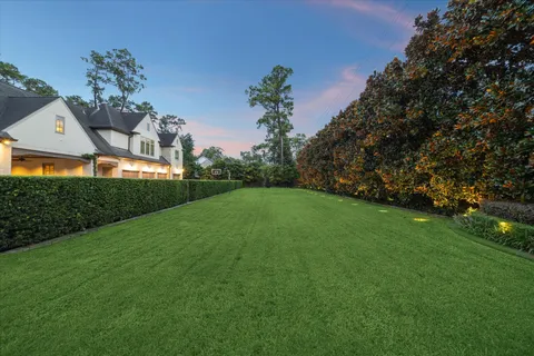 an aerial view of a house with a garden
