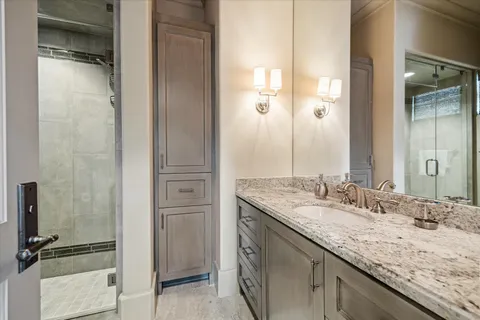 a bedroom with furniture and a fireplace