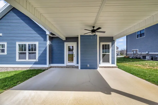a view of a porch with a big yard