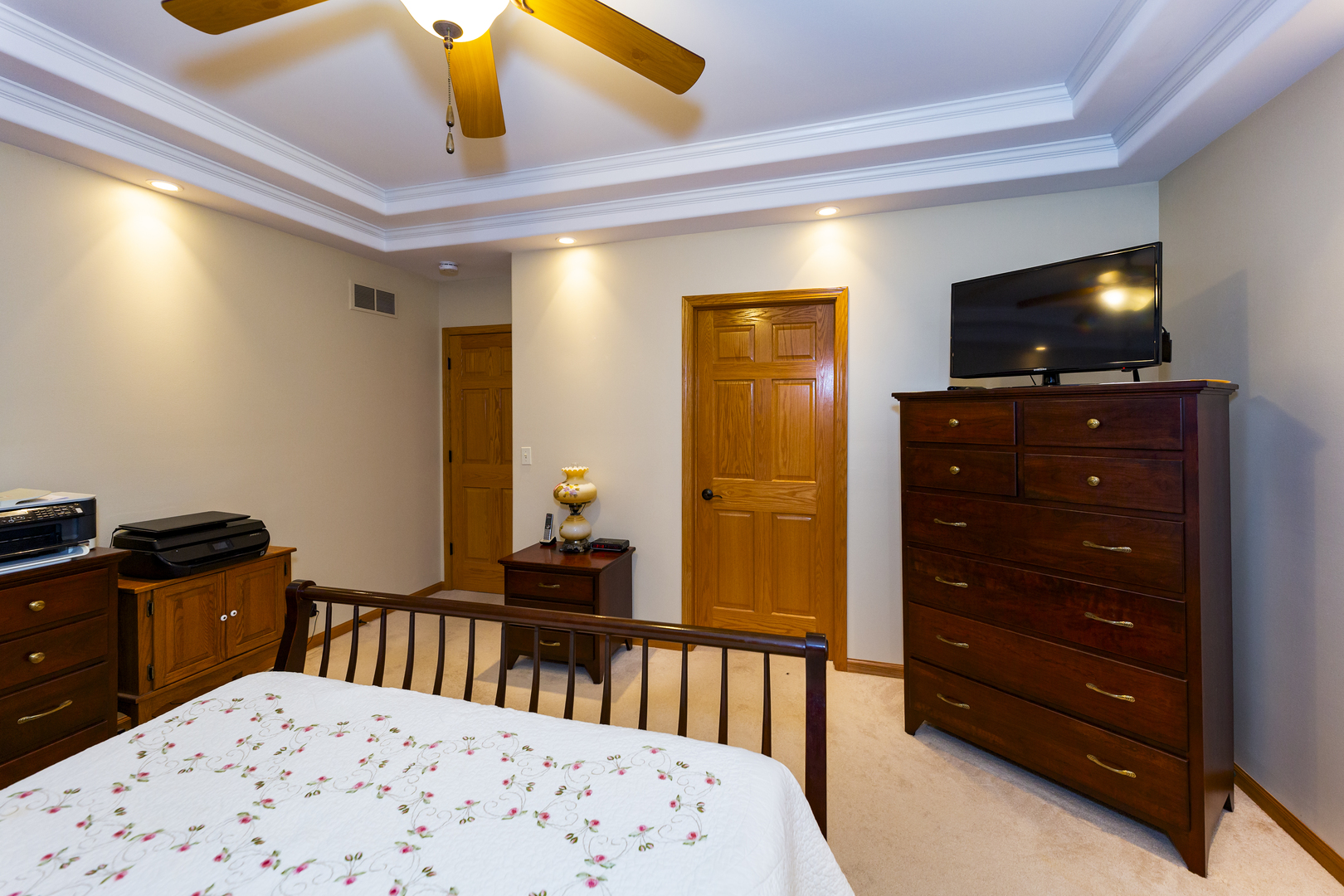 311 Stearn Drive Genoa, IL 60135 - Photo 27 of 48 a bedroom with a bed and a flat screen tv