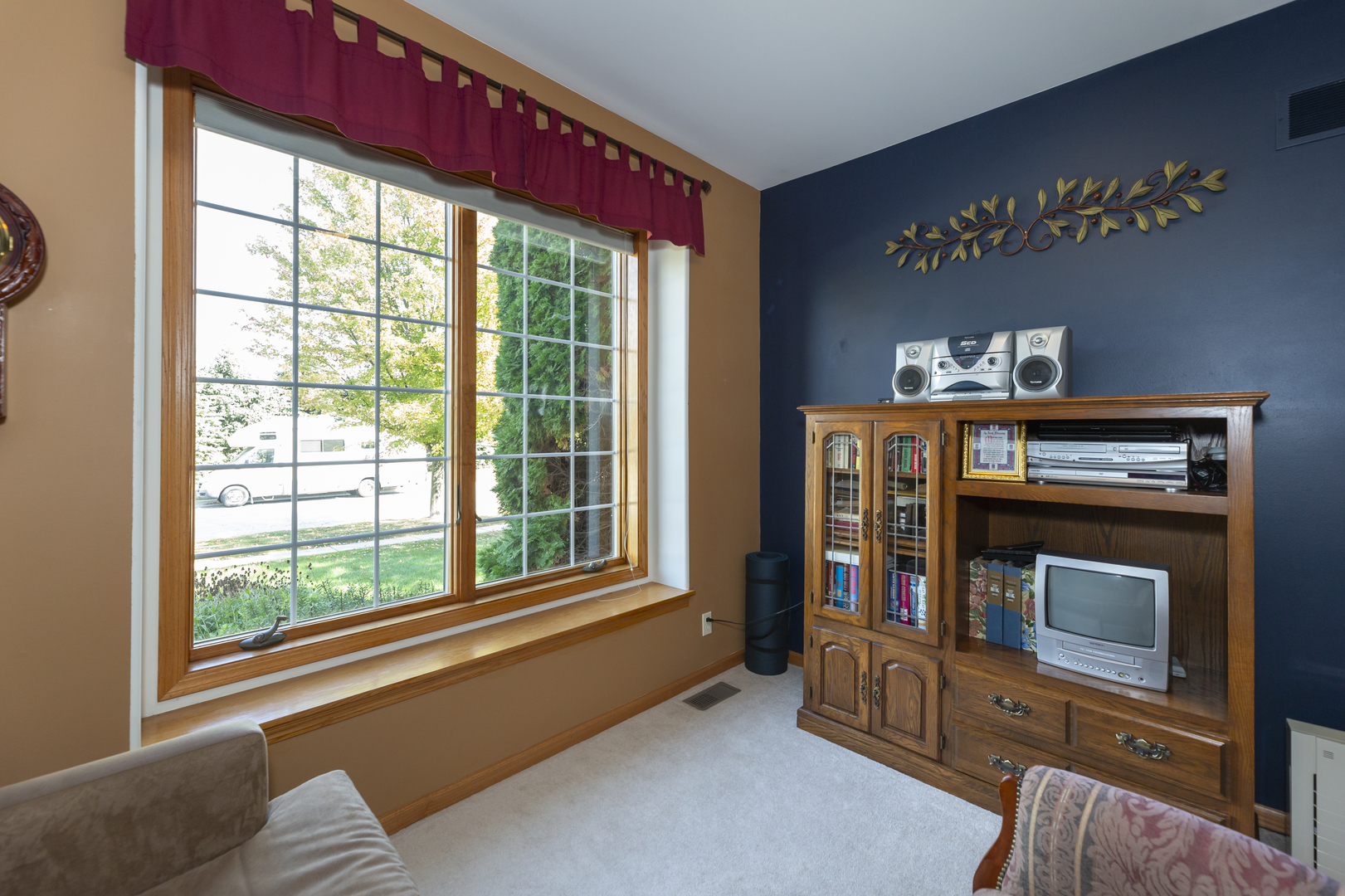 311 Stearn Drive Genoa, IL 60135 - Photo 30 of 48 a living room with furniture and a fireplace