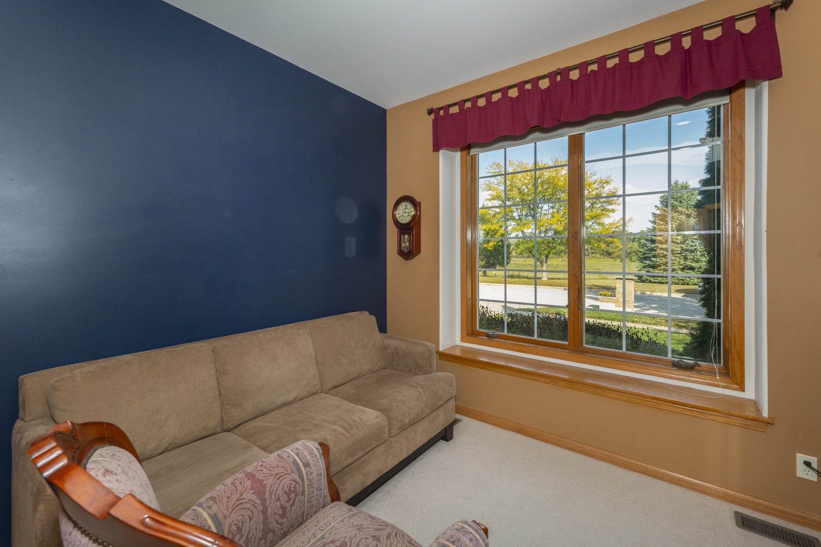 311 Stearn Drive Genoa, IL 60135 - Photo 31 of 48 a living room with furniture and a window