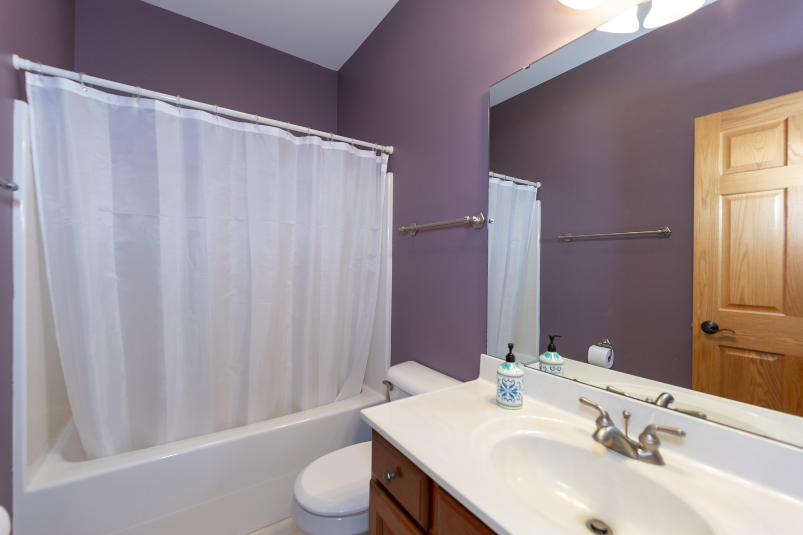 311 Stearn Drive Genoa, IL 60135 - Photo 32 of 48 a bathroom with a sink toilet and shower
