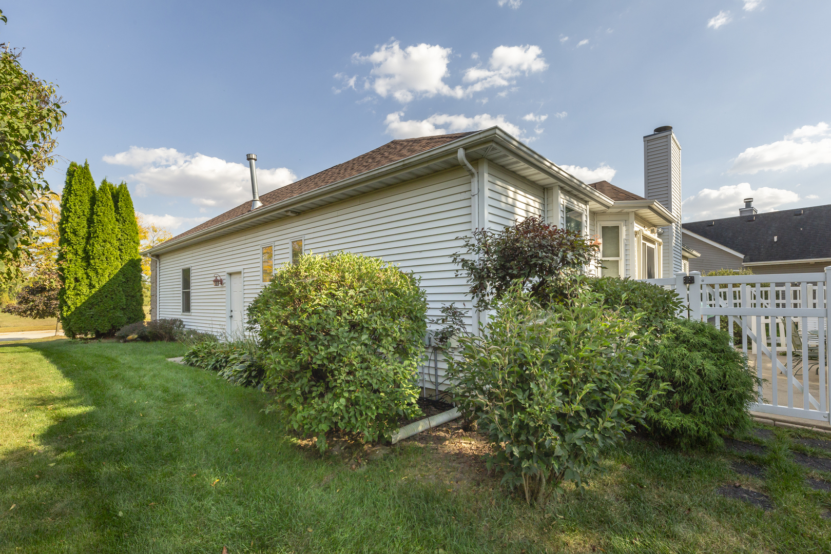 311 Stearn Drive Genoa, IL 60135 - Photo 46 of 48 a backyard of a house with lots of green space