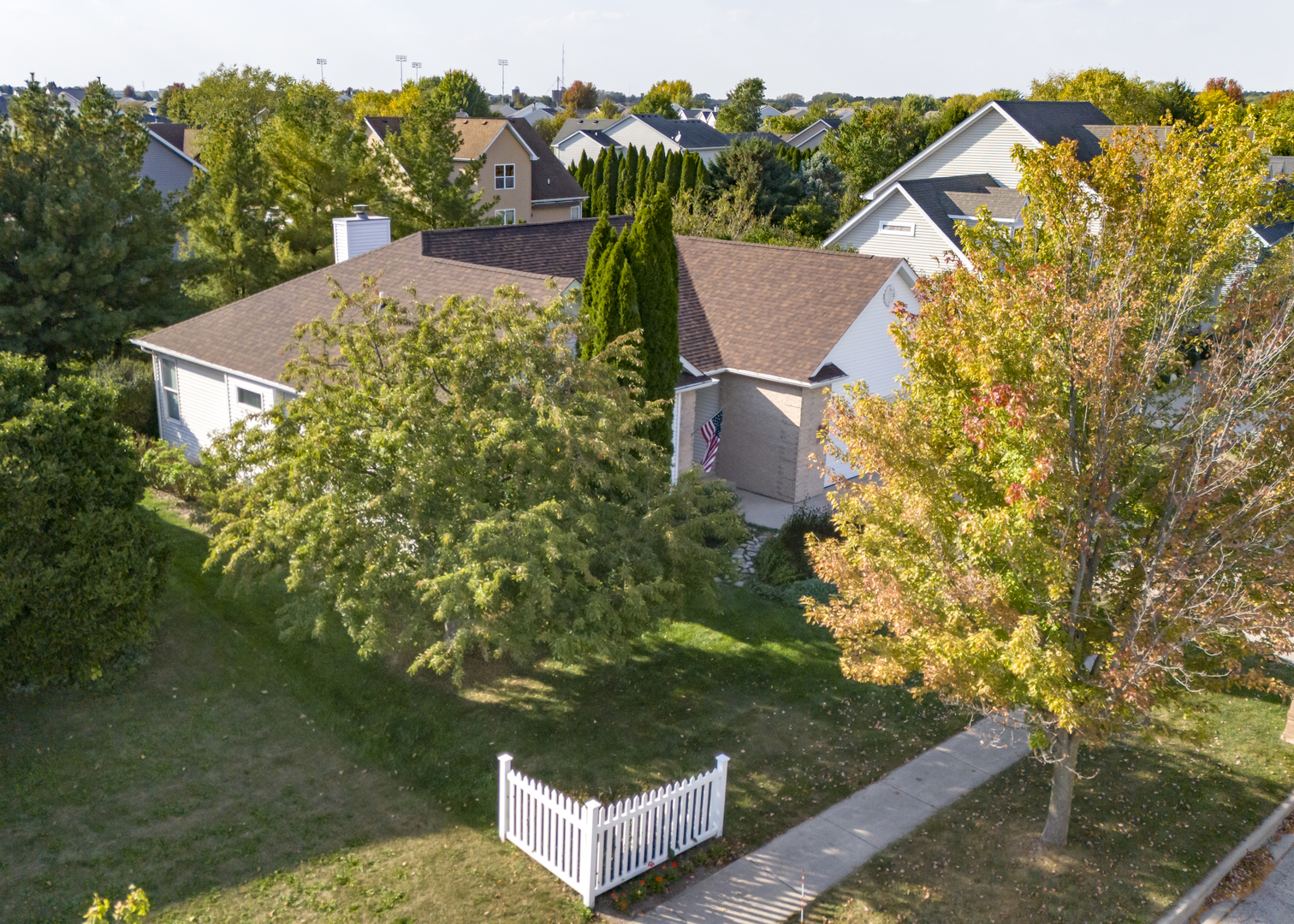 311 Stearn Drive Genoa, IL 60135 - Photo 8 of 48 aerial view of a house with a yard