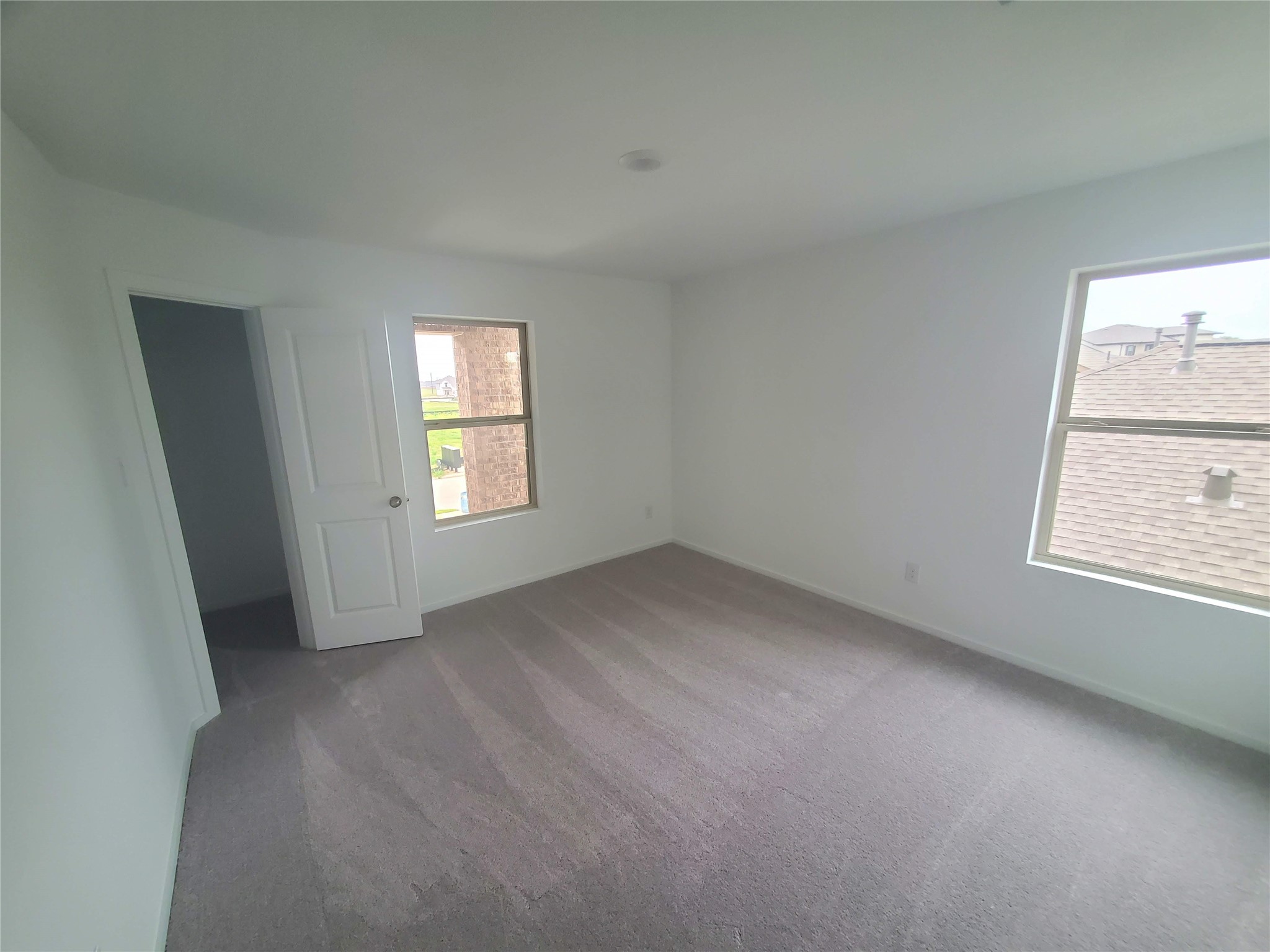 3115 Savannah Rose Drive Angleton, TX 77515 - Photo 12 of 20 an empty room with a window