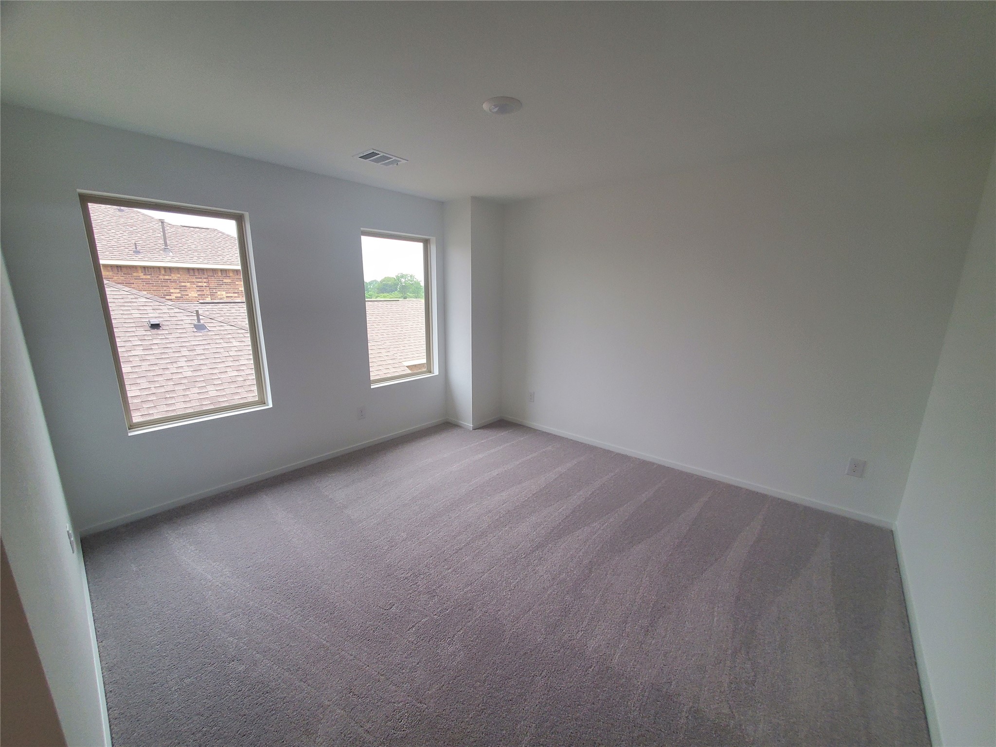 3115 Savannah Rose Drive Angleton, TX 77515 - Photo 17 of 20 an empty room with windows