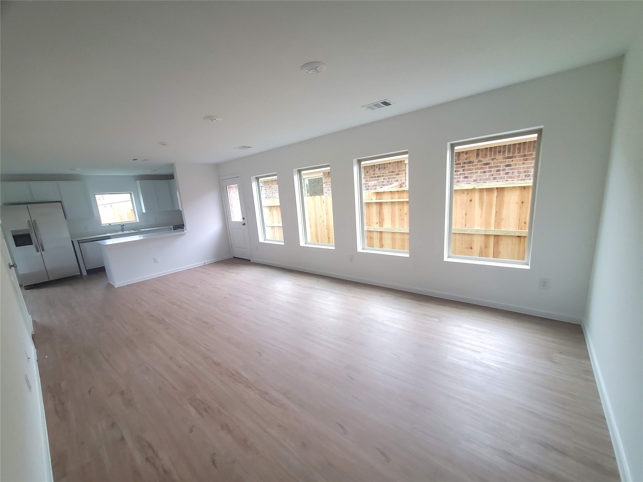 3115 Savannah Rose Drive Angleton, TX 77515 - Photo 2 of 20 a view of livingroom with window hardwood floor and window