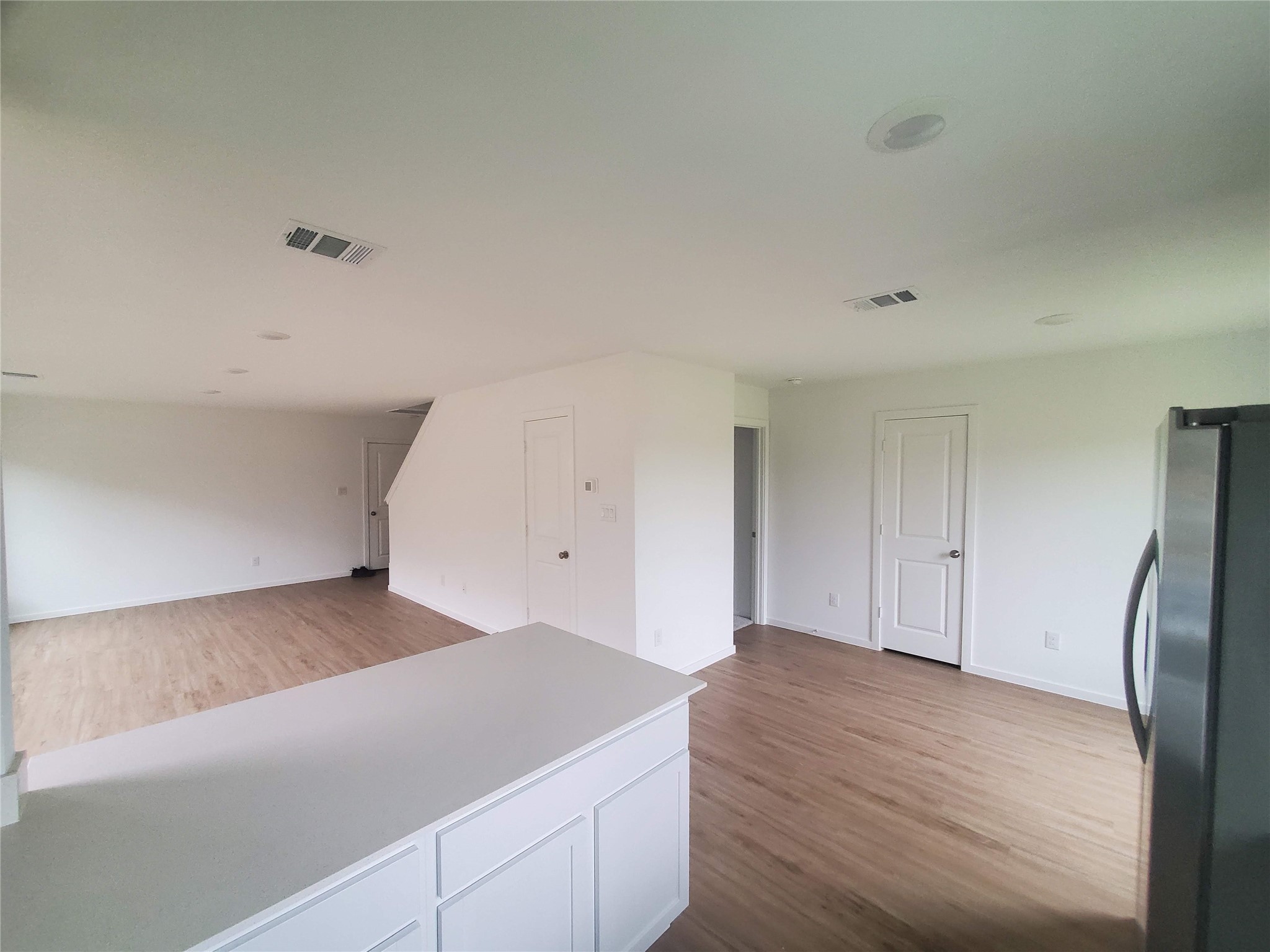 3115 Savannah Rose Drive Angleton, TX 77515 - Photo 3 of 20 a view of kitchen and empty room