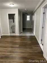 a room with bed and window