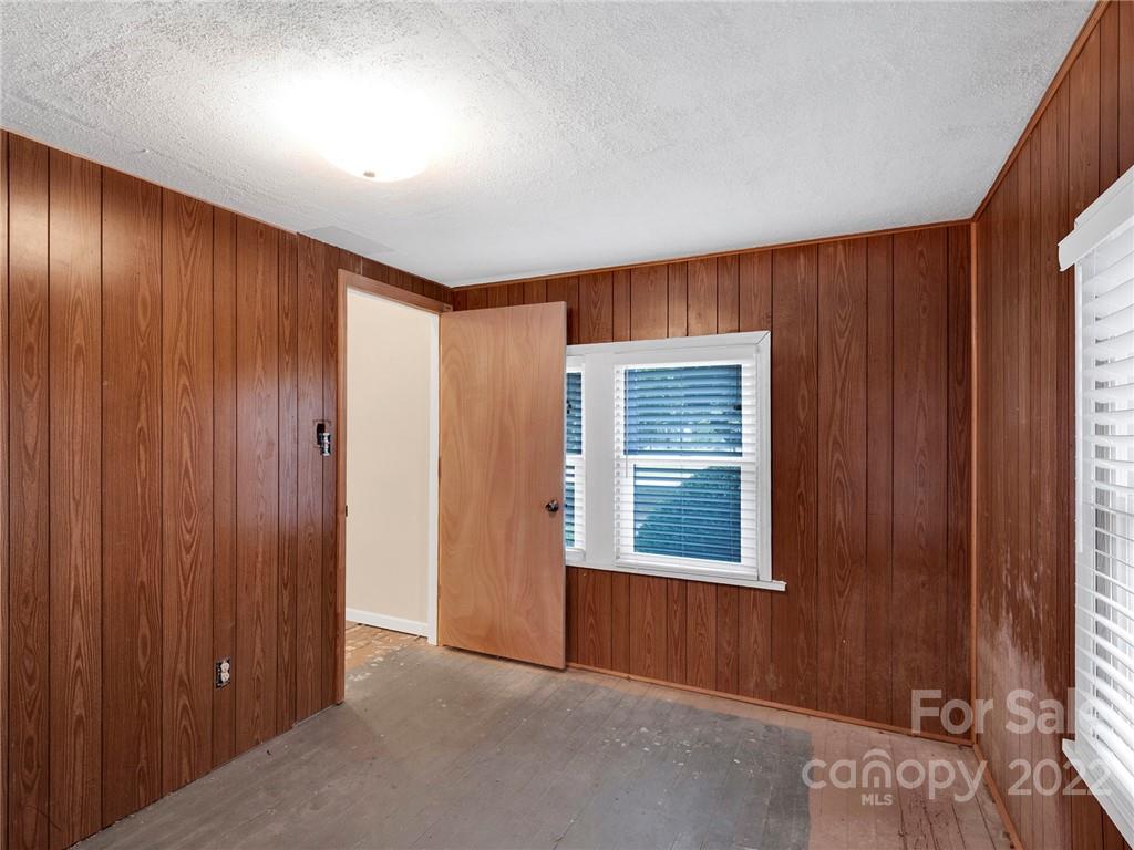 5614 Griffith Road Monroe, NC 28112 - Photo 11 of 28 an empty room with windows
