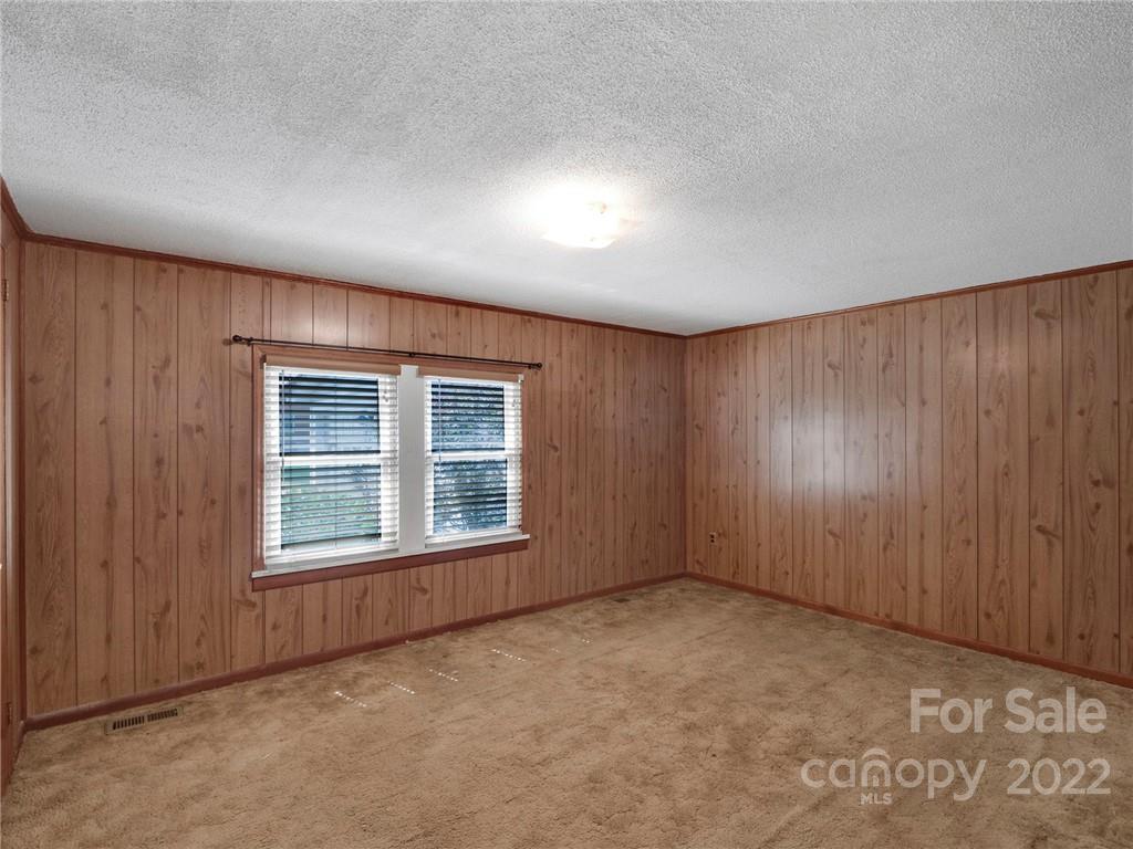 5614 Griffith Road Monroe, NC 28112 - Photo 18 of 28 an empty room with a window