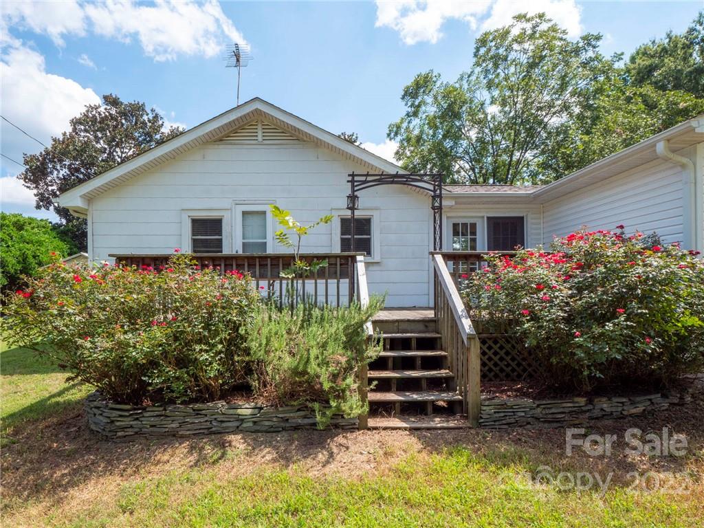 5614 Griffith Road Monroe, NC 28112 - Photo 2 of 28 a front view of house with yard and trees around