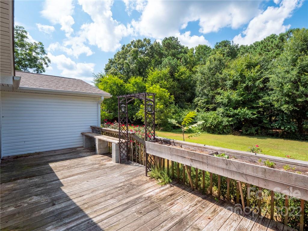 5614 Griffith Road Monroe, NC 28112 - Photo 4 of 28 a view of a terrace with chairs