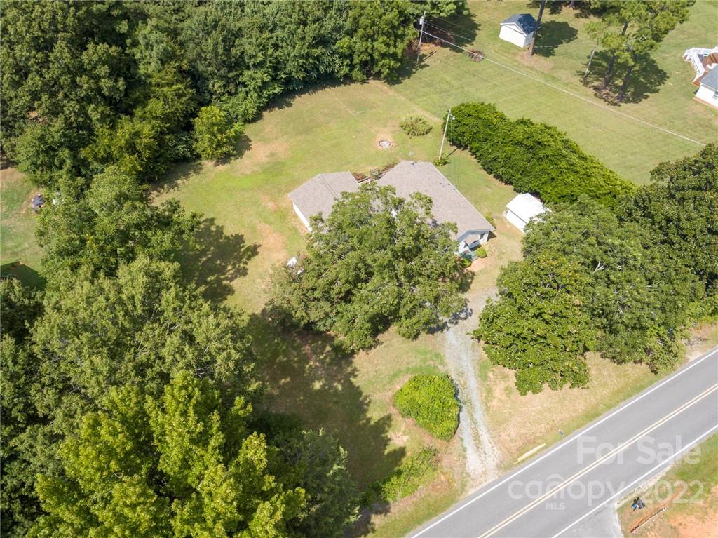 5614 Griffith Road Monroe, NC 28112 - Photo 6 of 28 a view of a lake with a yard