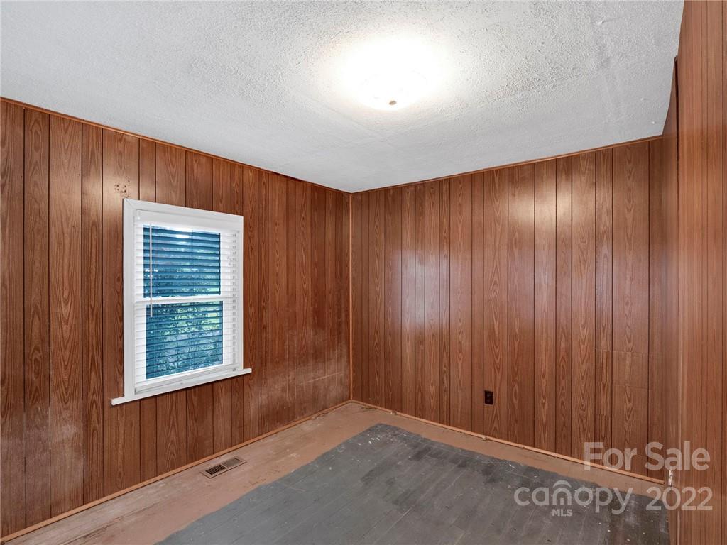 5614 Griffith Road Monroe, NC 28112 - Photo 10 of 28 an empty room with windows