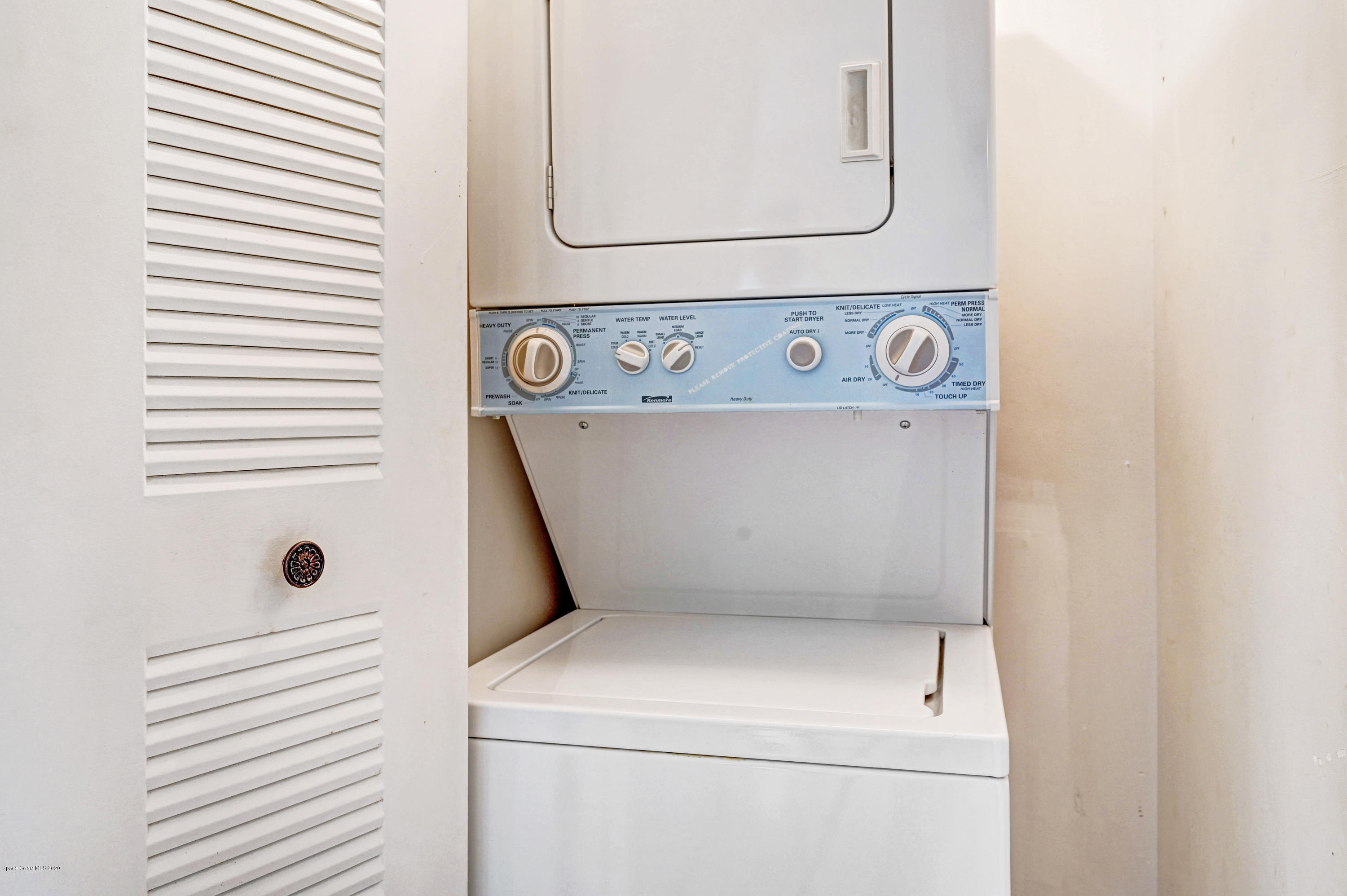 708 Ridge Club Drive, Unit 37 Melbourne, FL 32934 - Photo 17 of 25 a utility room with dryer and washer