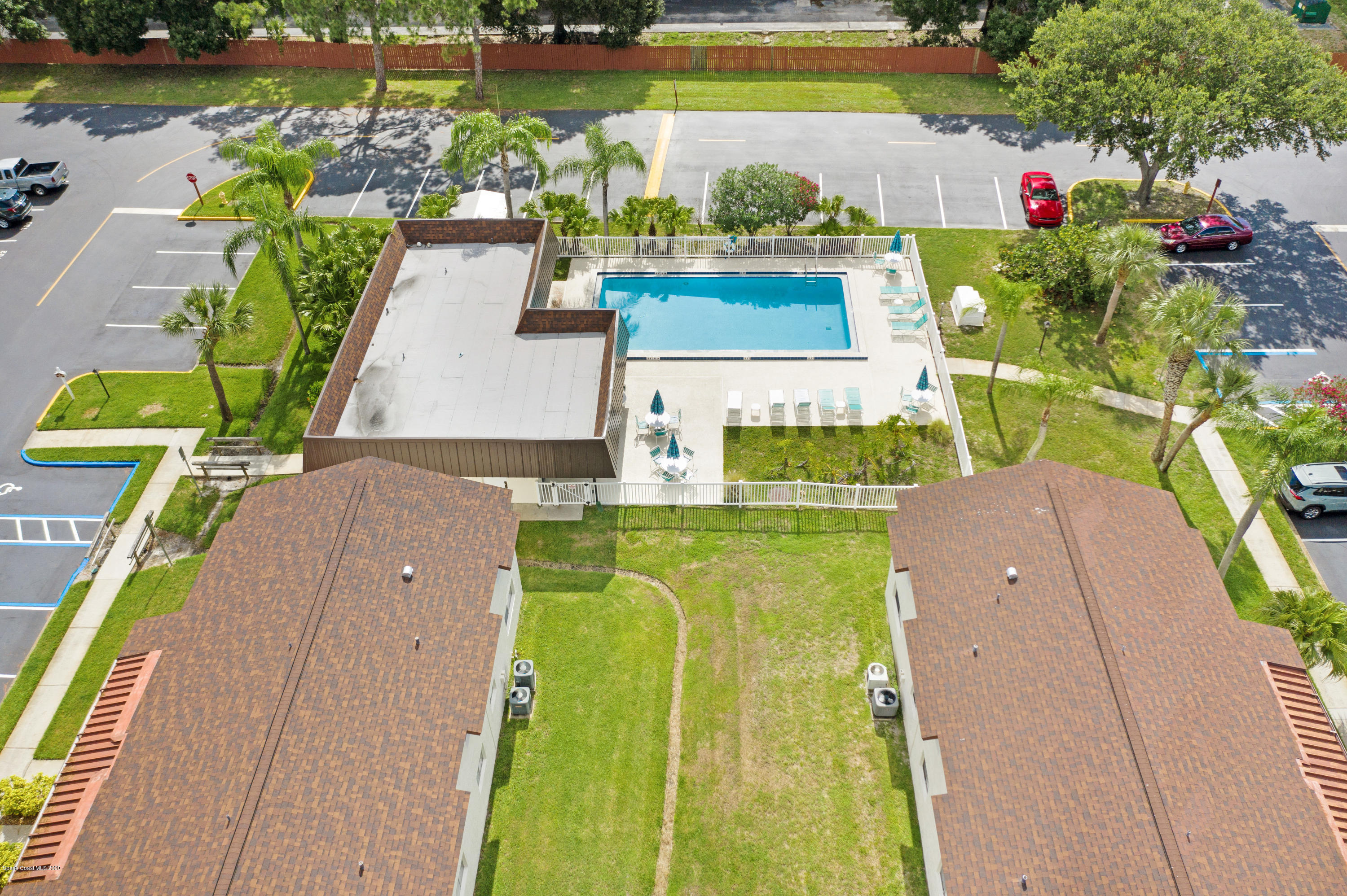 708 Ridge Club Drive, Unit 37 Melbourne, FL 32934 - Photo 20 of 25 an aerial view of a house with a swimming pool