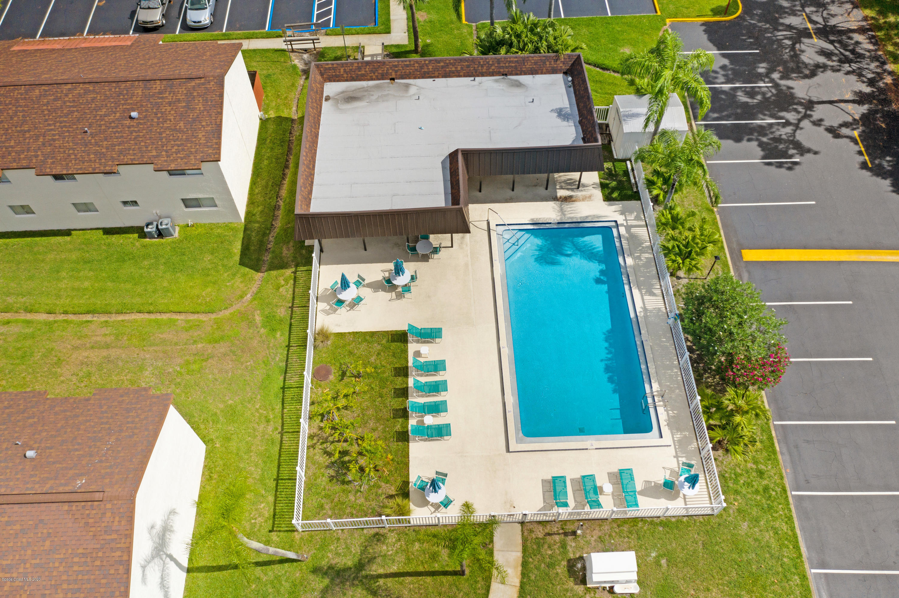 708 Ridge Club Drive, Unit 37 Melbourne, FL 32934 - Photo 21 of 25 aerial view of a house with a swimming pool
