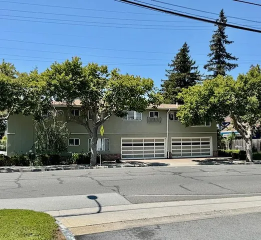 front view of a house with a street