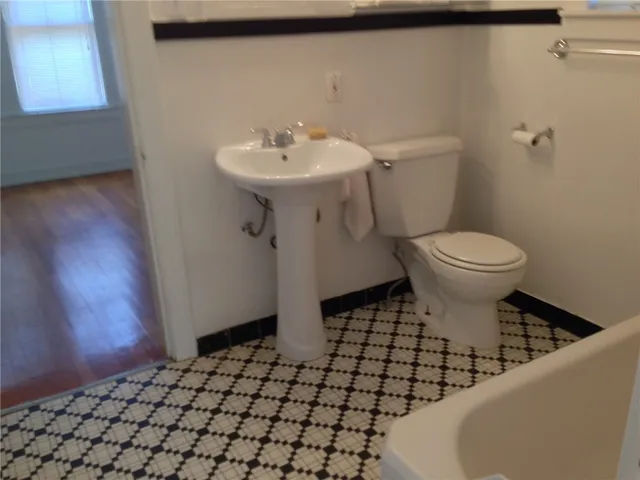 a bathroom with a sink and a toilet