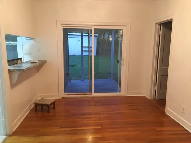 a view of livingroom with furniture and wooden floor