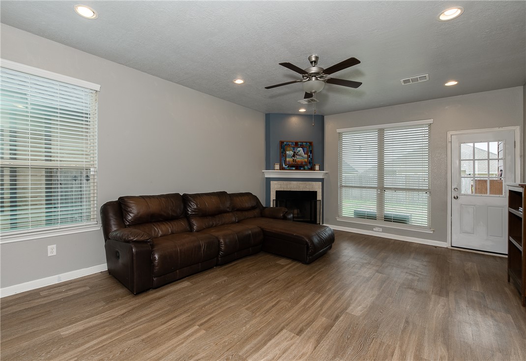 2018 Stubbs Drive Bryan, TX 77807 - Photo 18 of 41 a living room with furniture and a fireplace