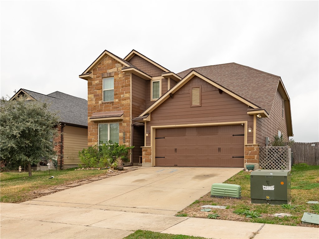 2018 Stubbs Drive Bryan, TX 77807 - Photo 2 of 41 Craftsman inspired home featuring stone siding, a shingled roof, and concrete driveway