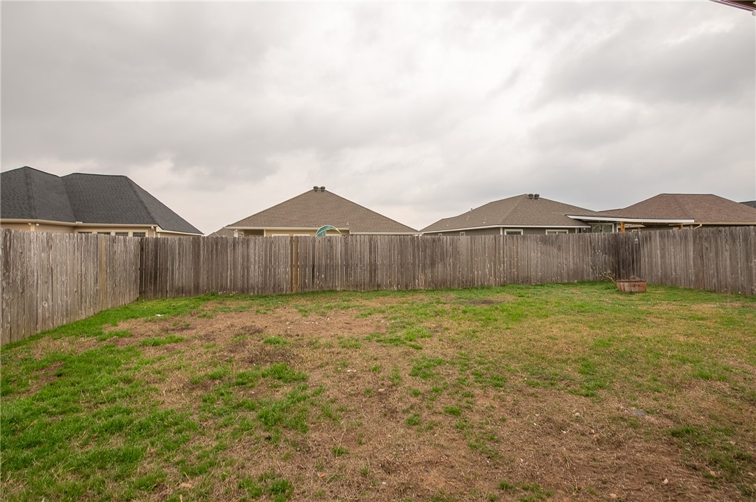 2018 Stubbs Drive Bryan, TX 77807 - Photo 39 of 41 a view of a backyard with green space