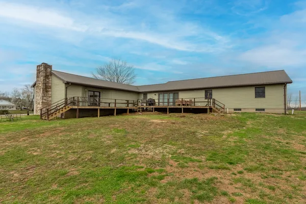 a view of swimming pool with lounge chair