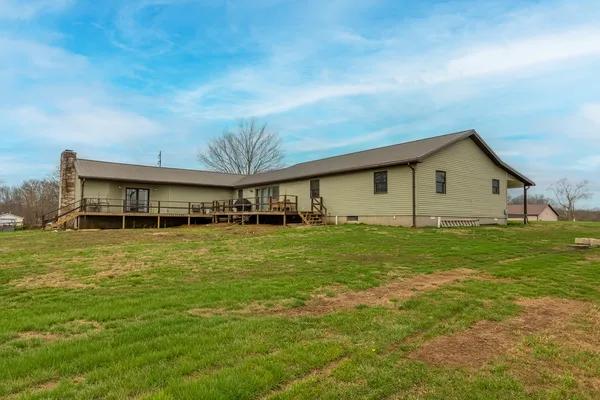 a house view with garden space