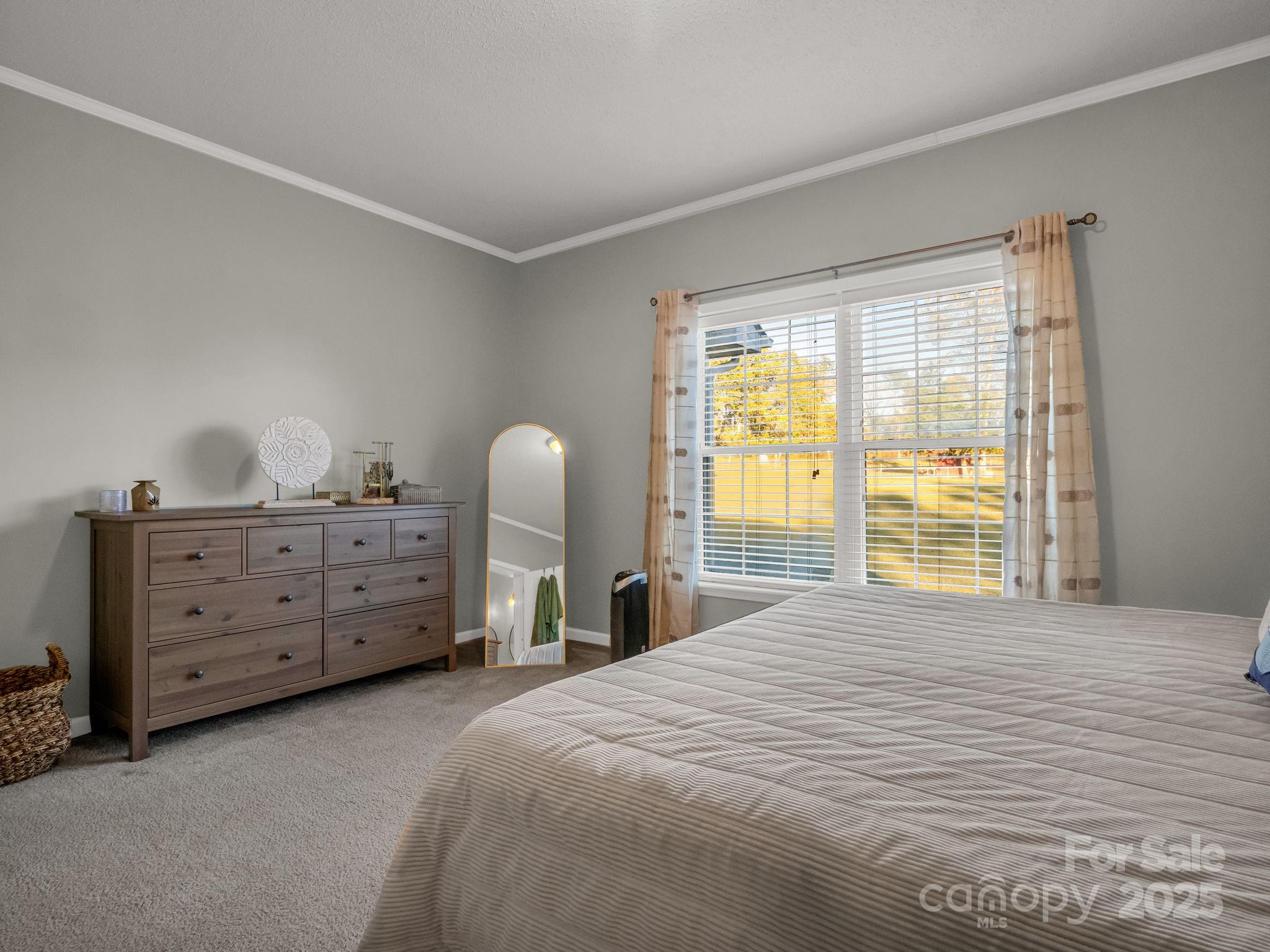 435 Brooks Road Bostic, NC 28018 - Photo 19 of 41 a bedroom with a bed and a dresser