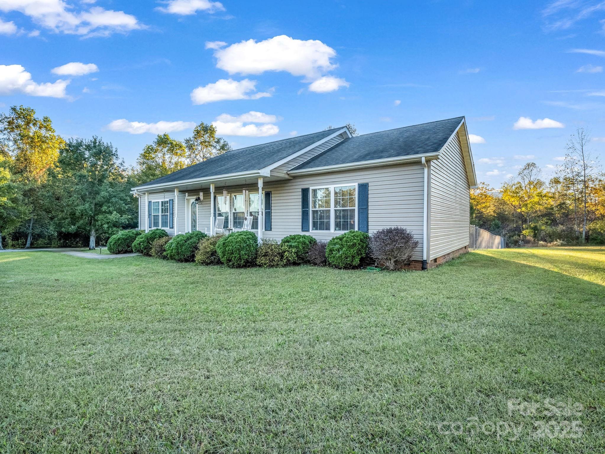 435 Brooks Road Bostic, NC 28018 - Photo 2 of 41 a view of a house with backyard and garden