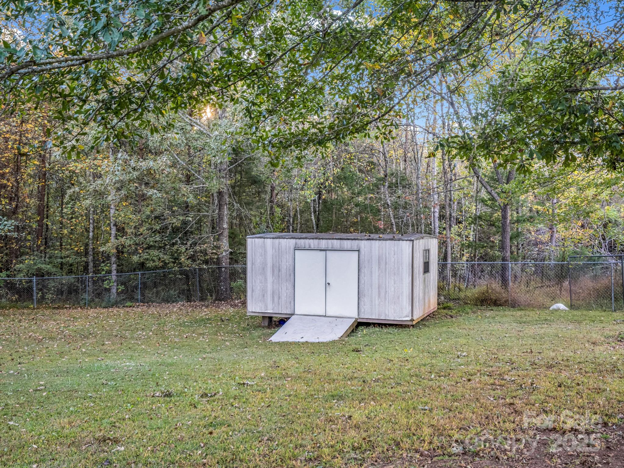 435 Brooks Road Bostic, NC 28018 - Photo 39 of 41 a view of backyard with small cabin