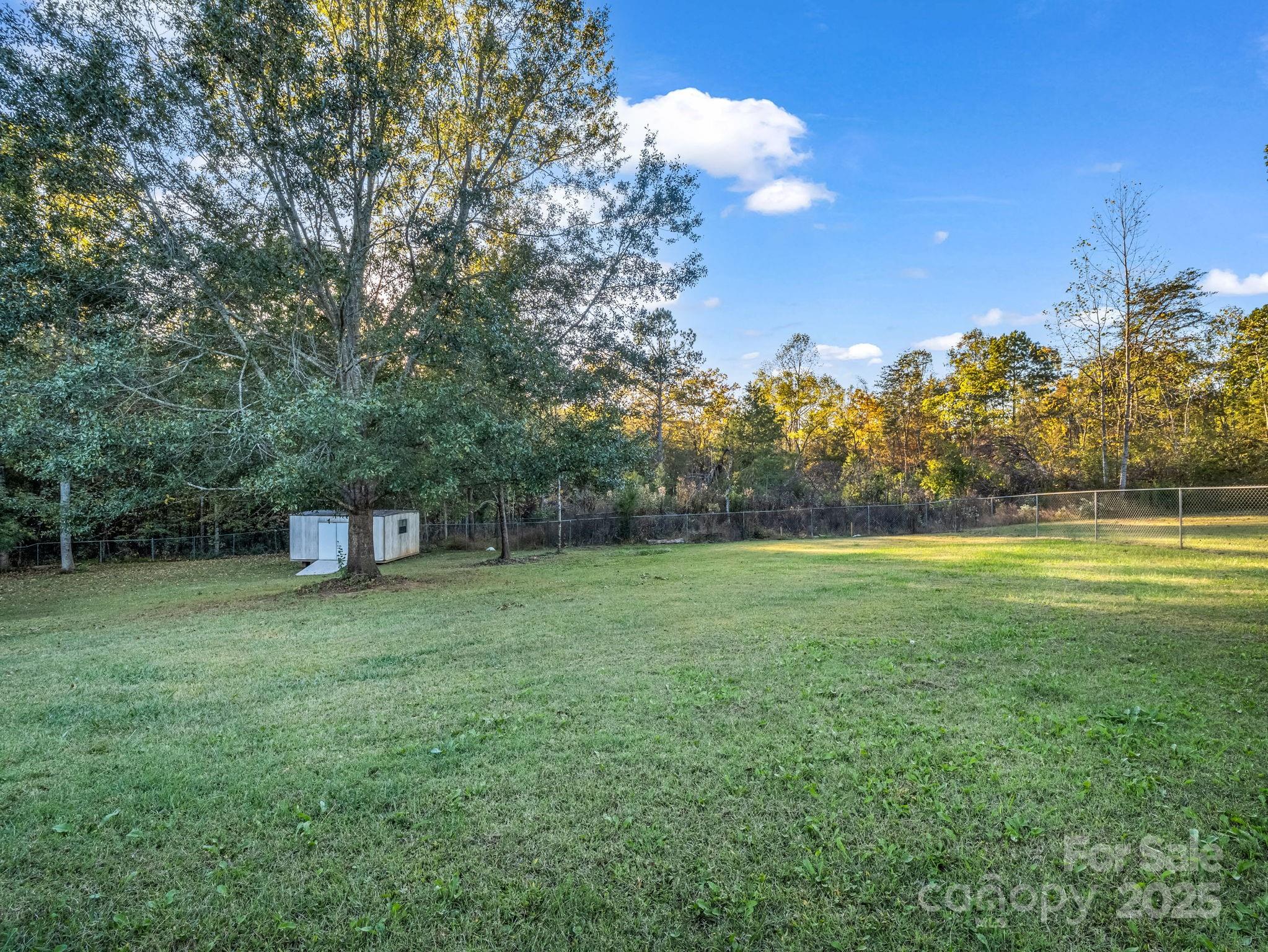 435 Brooks Road Bostic, NC 28018 - Photo 41 of 41 a view of a field of grass and trees
