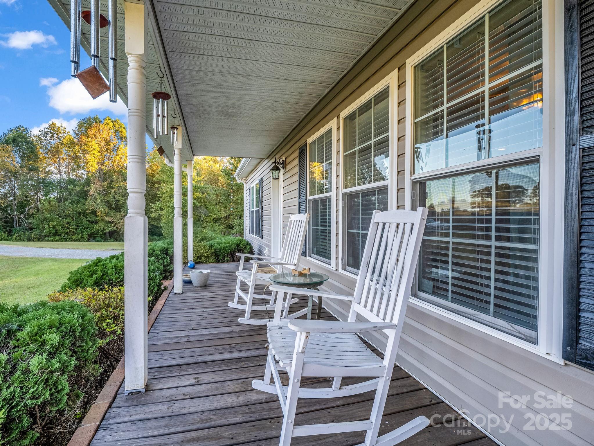 435 Brooks Road Bostic, NC 28018 - Photo 5 of 41 a view of a chairs and table in the balcony