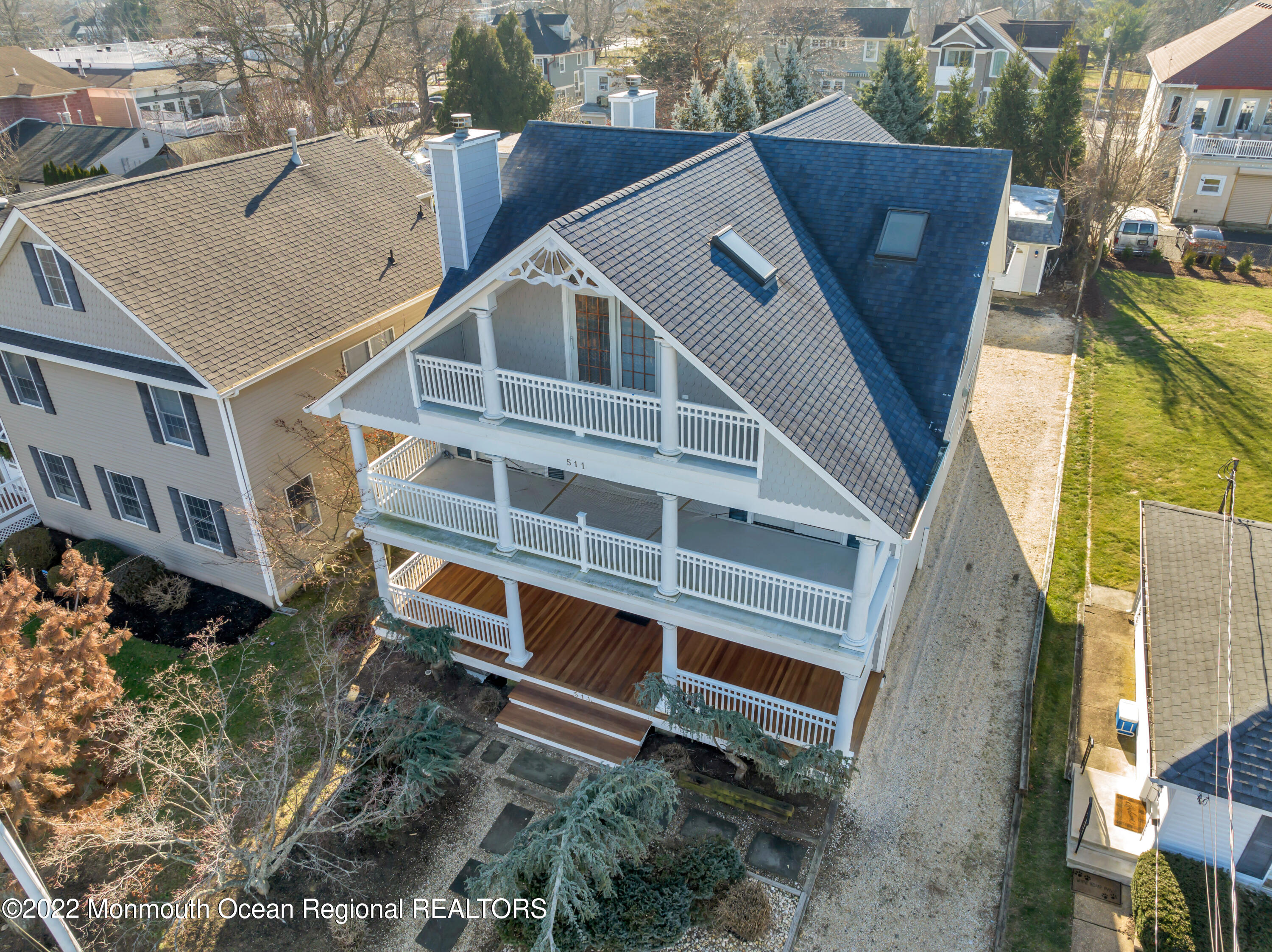 511 Passaic Avenue Spring Lake, NJ 07762 - Photo 13 of 105 a front view of a house with a yard