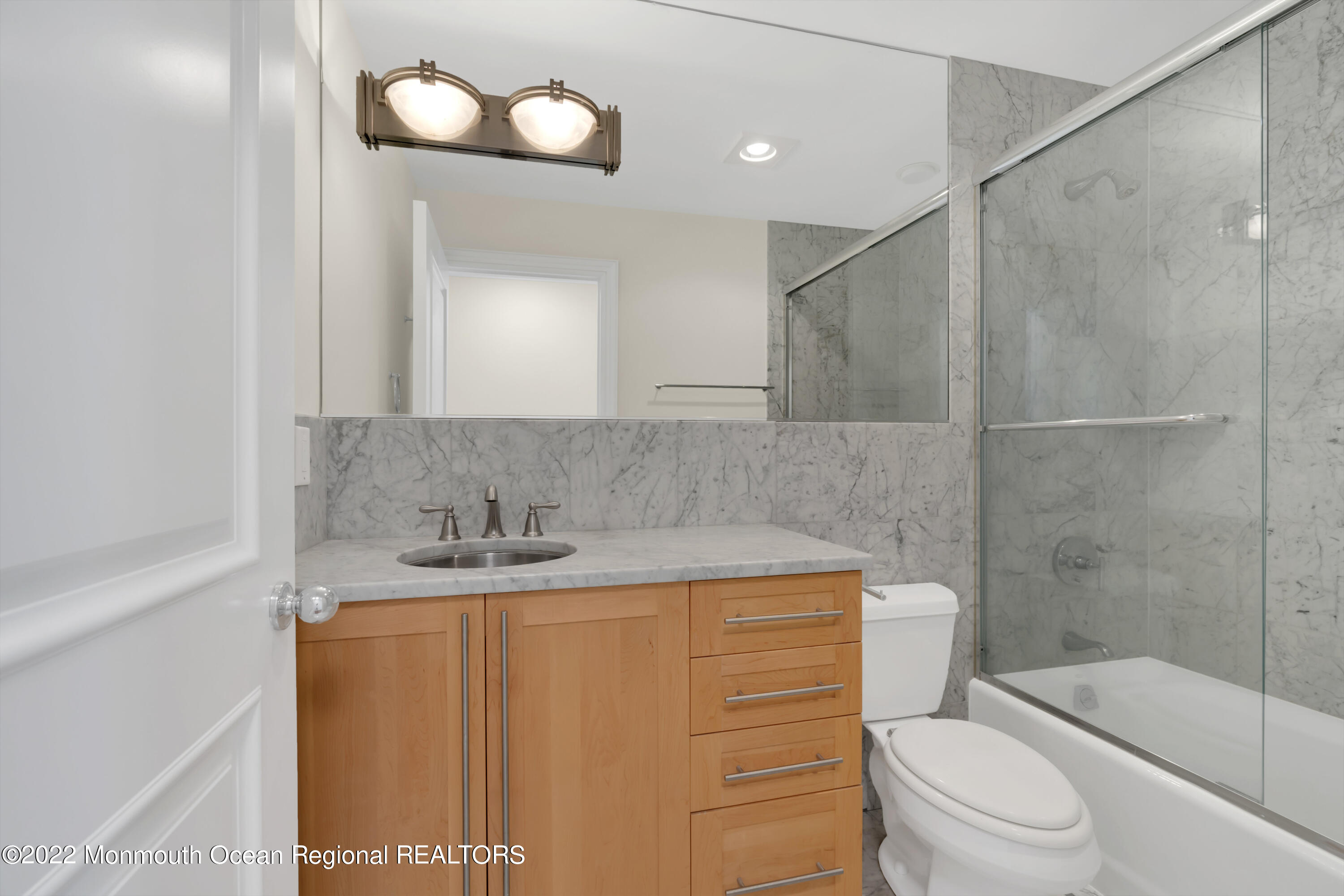 511 Passaic Avenue Spring Lake, NJ 07762 - Photo 58 of 105 a bathroom with a sink a toilet and shower