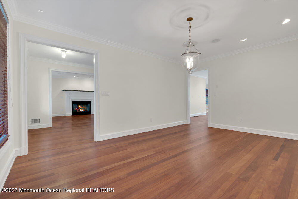511 Passaic Avenue Spring Lake, NJ 07762 - Photo 93 of 105 a view of a room with wooden floor and a window